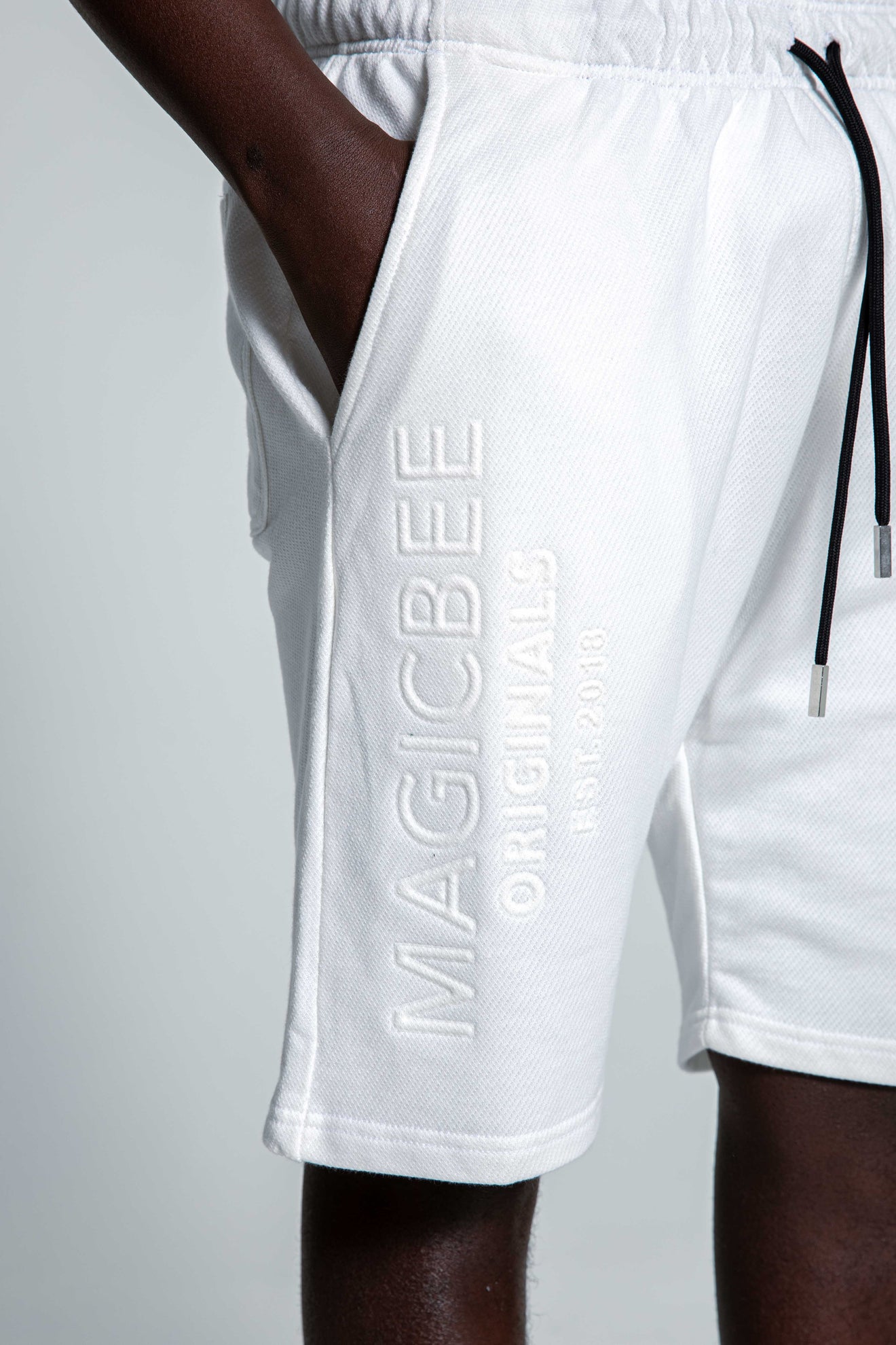 MagicBee Originals Embossed Logo Shorts - Off White